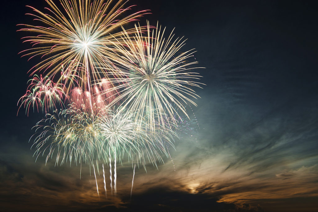 Brightly colorful fireworks in the night sky