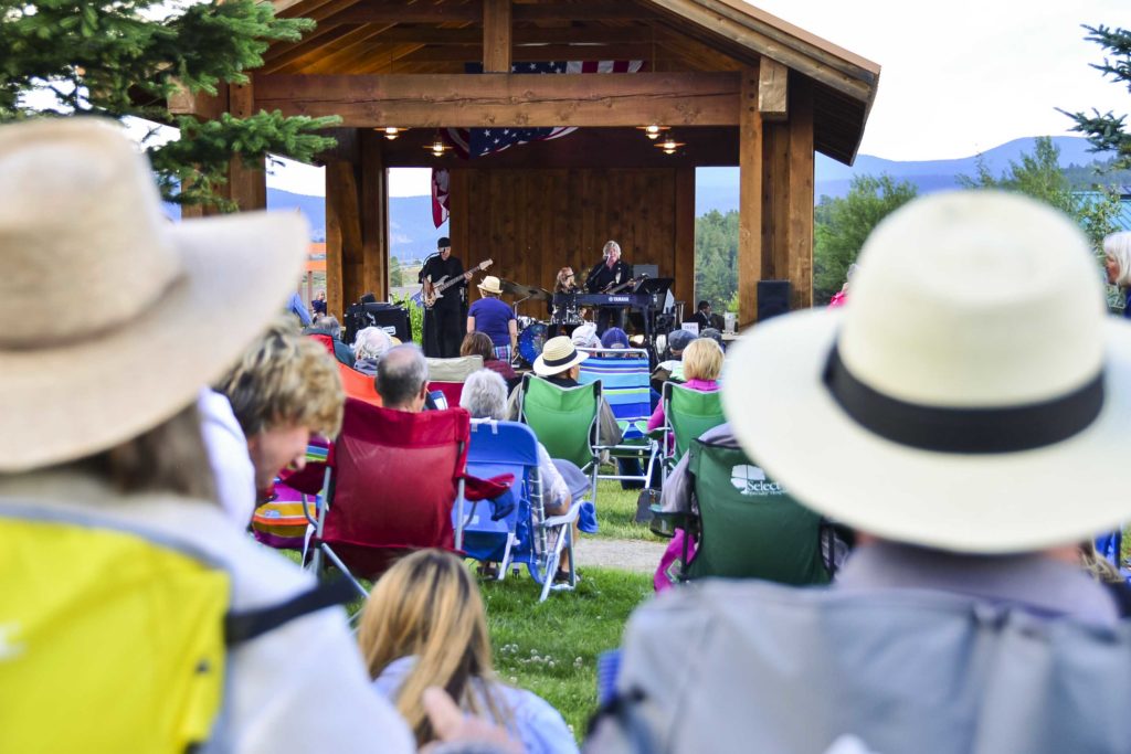A crowd watchs the Jimmy Stadler Band at the Cool Summer Nights Concert Series at Frontier Park